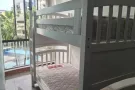 樟宜医院对面，四美公寓，旁边工业区，靠近博览中心，机场，楼下巴士站，步行MRT7分钟，公寓各种设施，环境优美